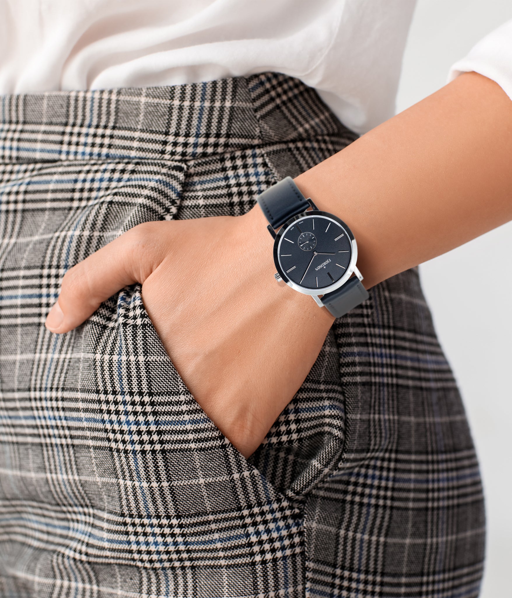 Woman wearing watch - Fjordson watch with black dial and vegan leather strap - UNISEX - vegan & approved by PETA - Swiss made