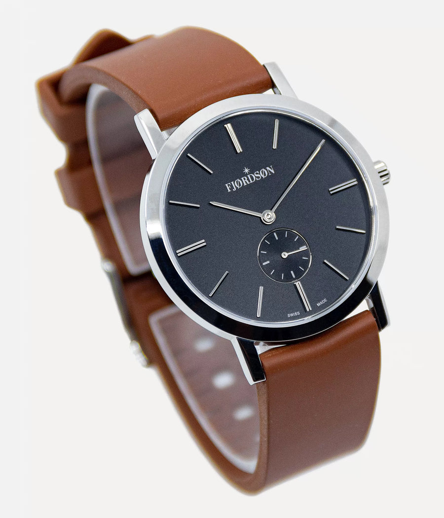 Front shot - Fjordson watch with black dial and brown rubber watch strap - UNISEX - vegan & approved by PETA - Swiss made